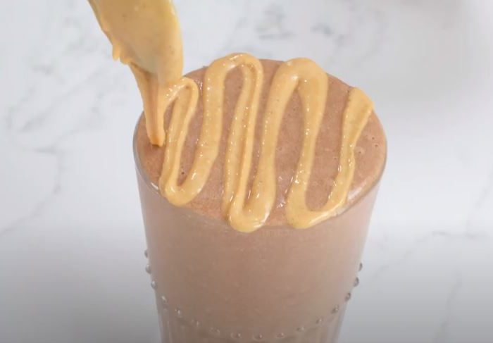Want something quick, yummy to bring with you? Check out this fantastic peanut butter mocha smoothie and take it to work.
