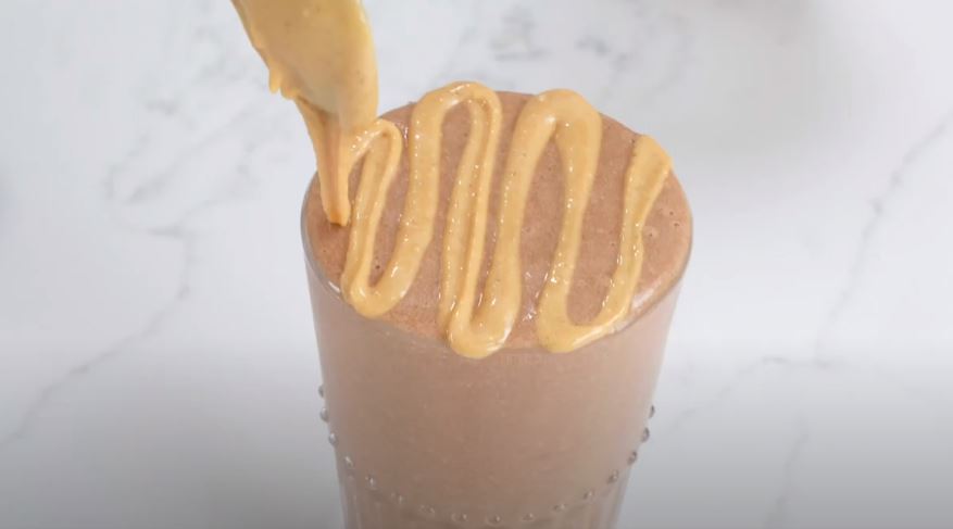 Want something quick, yummy to bring with you? Check out this fantastic peanut butter mocha smoothie and take it to work.